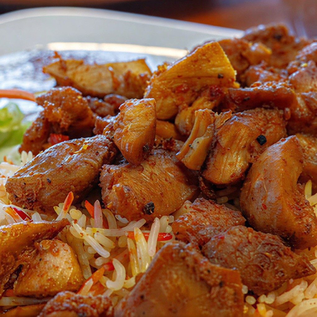 Boneless Tikka Chicken Over Rice.